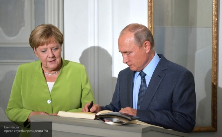 Путин и Меркель по телефону обсудили нормандский саммит и обстановку в Сирии